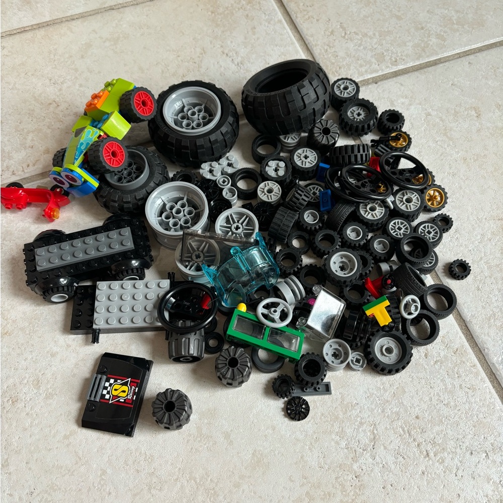 Lego Wheels, steering wheels, tires, and various car parts!